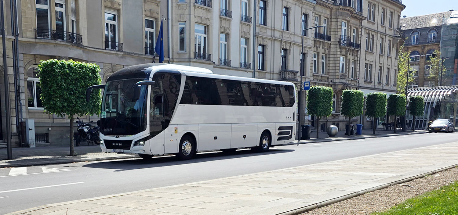 real 8rental bus on road