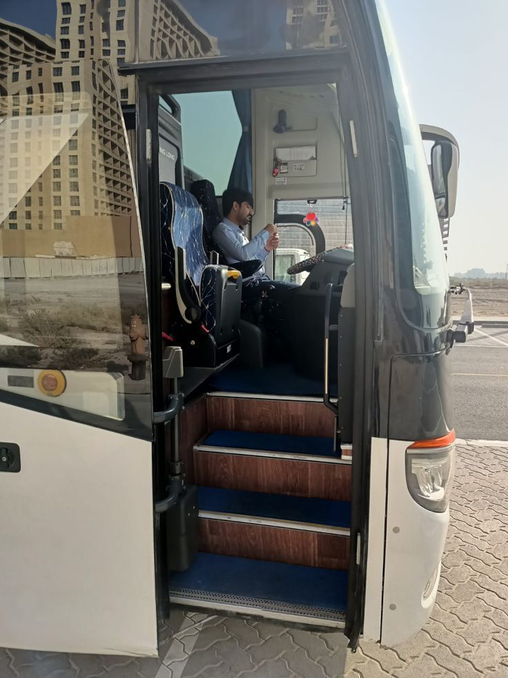 Coach driver waiting for passengers