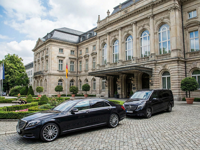 Cars with drivers waiting for passengers
