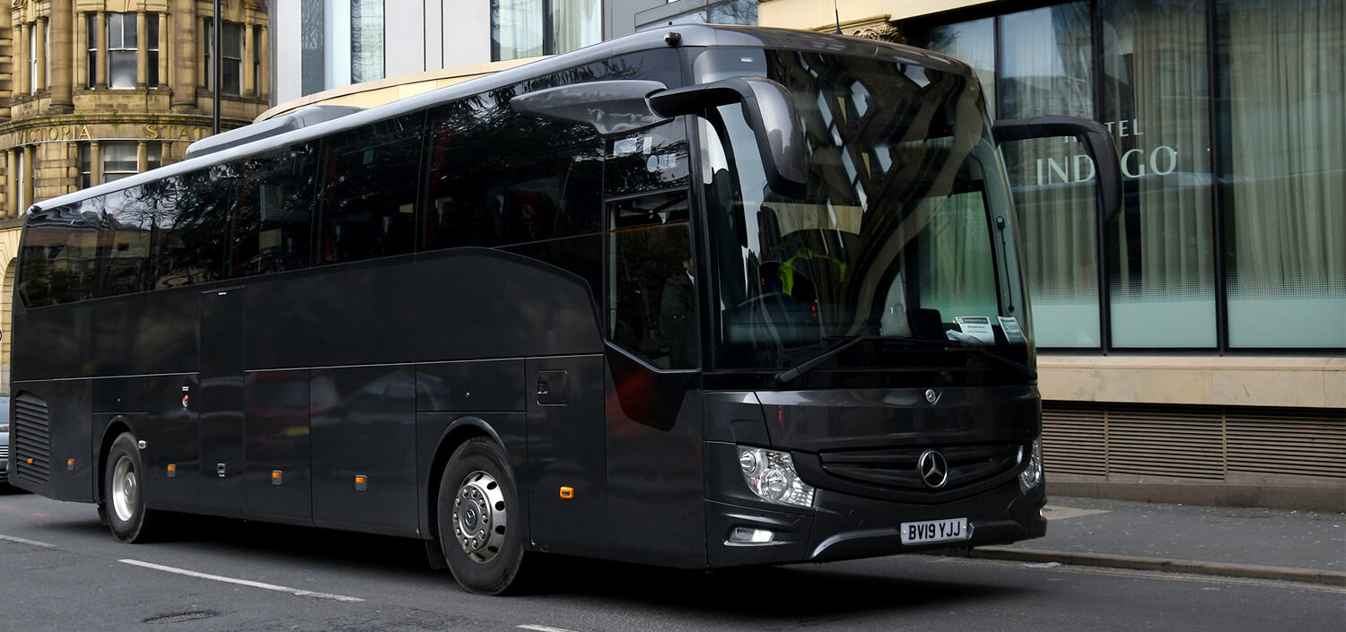 bus with driver on street