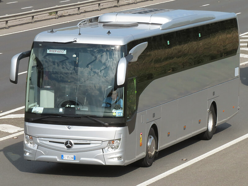 bus on highway with driver