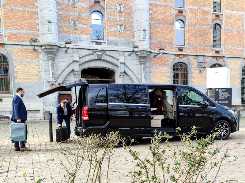 real passengers put luggage in minibus
