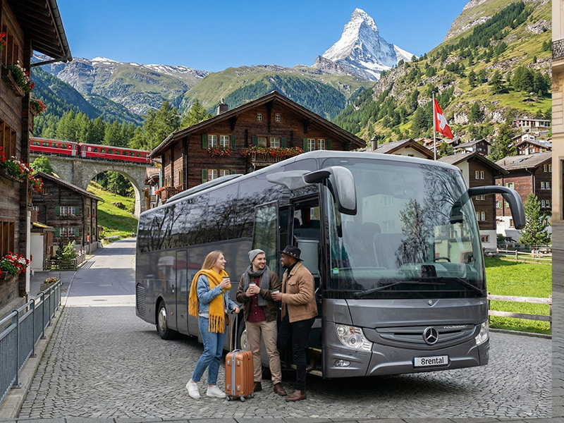 coach with group in alps