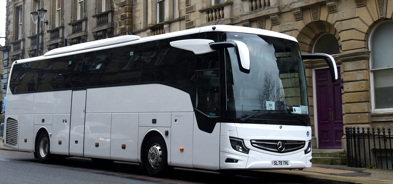 white 8rental coach travel